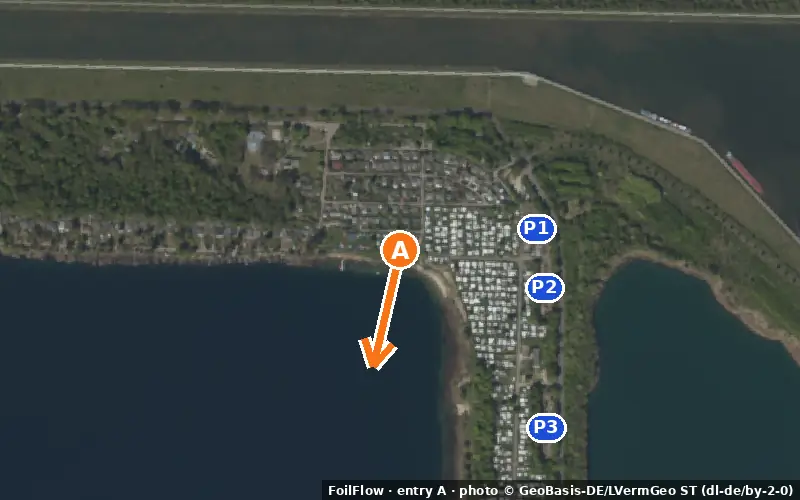 Aerial photo of entry A at Barleber See: the arrow points onto the water, P = car parks