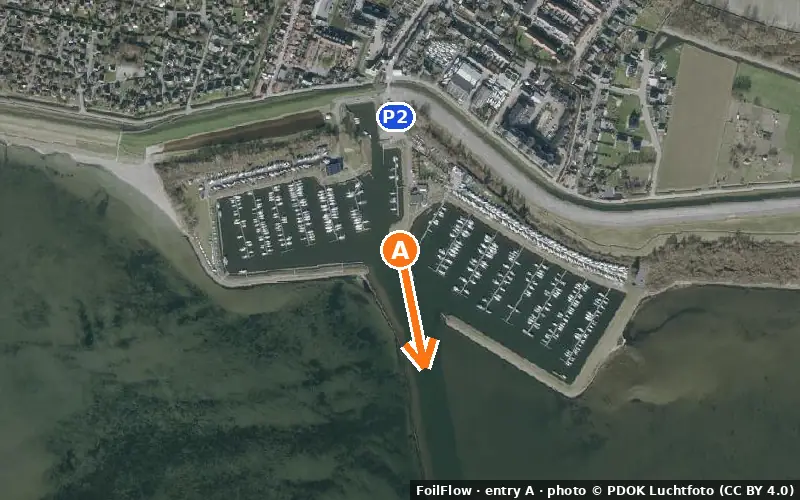 Aerial photo of entry A at Bruinisse: the arrow points onto the water, P = car parks