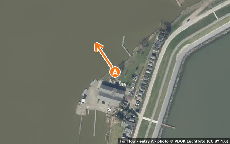 Aerial photo of entry A at Noord (IJmeer): the arrow points onto the water, P = car parks