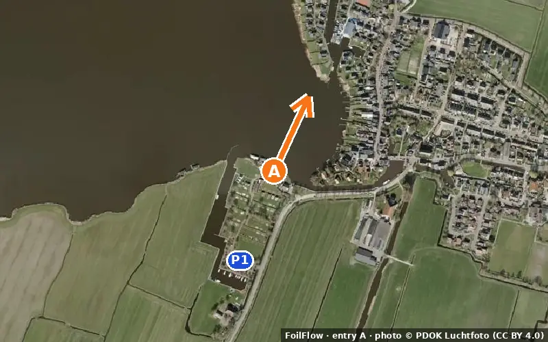 Aerial photo of entry A at Oudega: the arrow points onto the water, P = car parks