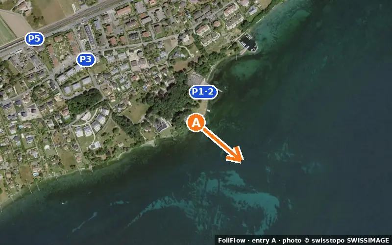 Aerial photo of entry A at Saint-Prex (Lac Léman): the arrow points onto the water, P = car parks
