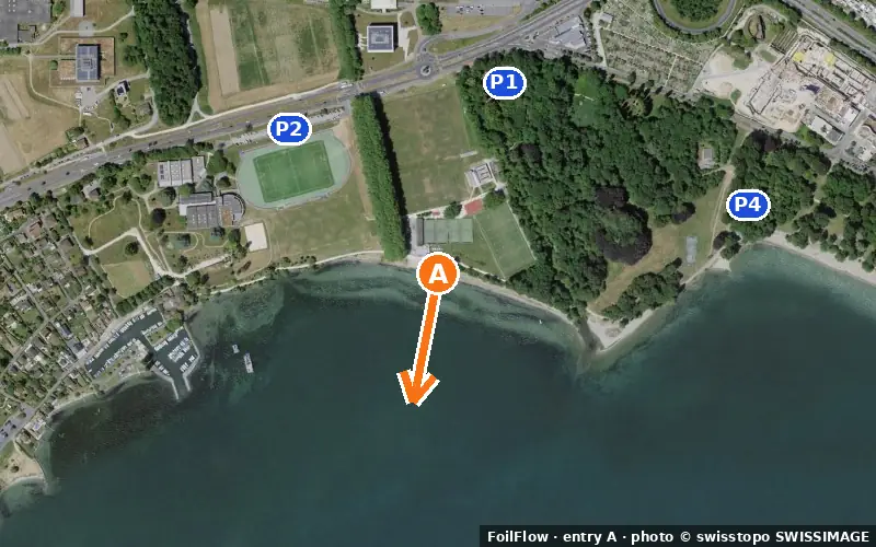 Aerial photo of entry A at Saint-Sulpice (Lac Léman): the arrow points onto the water, P = car parks