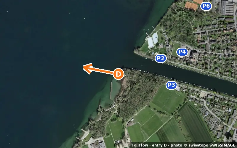 Aerial photo of entry D at Sutz-Lattrigen (Bielersee): the arrow points onto the water, P = car parks
