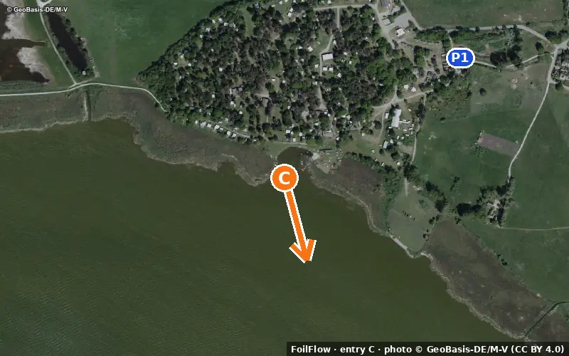 Aerial photo of entry C at unknown place (Saaler Bodden): the arrow points onto the water, P = car parks