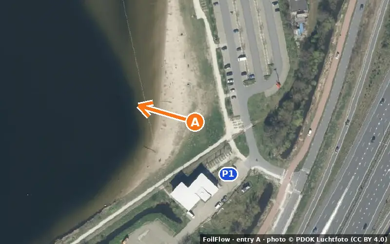 Aerial photo of entry A at Valkenburgse Meer: the arrow points onto the water, P = car parks