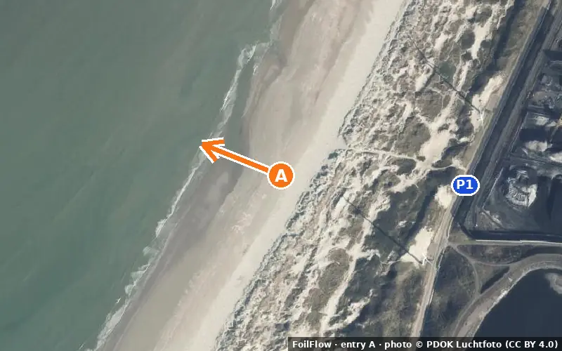 Aerial photo of entry A at Wijk aan Zee: the arrow points onto the water, P = car parks